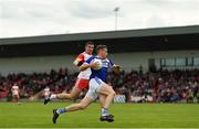 22 June 2019; Kieran Lillis of Laois in action against Ciaran McFaul of Derry during the GAA Football All-Ireland Senior Championship Round 2 match between Derry and Laois at Derry GAA Centre of Excellence in Owenbeg, Derry. Photo by Ramsey Cardy/Sportsfile