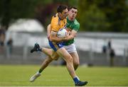 22 June 2019; Gary Brennan of Clare in action against Paddy Maguire of Leitrim during the GAA Football All-Ireland Senior Championship Round 2 match between Leitrim and Clare at Avantcard Páirc Seán Mac Diarmada in Carrick-on-Shannon, Leitrim. Photo by Daire Brennan/Sportsfile
