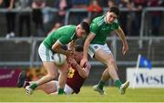 22 June 2019; Joe Halligan of Westmeath is dispossessed by Iain Corbett, left, and Colm McSweeney of Limerick during the GAA Football All-Ireland Senior Championship Round 2 match between Westmeath and Limerick at TEG Cusack Park in Mullingar, Co. Westmeath. Photo by Diarmuid Greene/Sportsfile