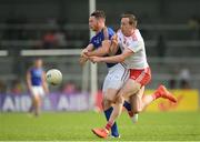 22 June 2019; Michael Quinn of Longford in action against Colm Cavanagh of Tyrone during the GAA Football All-Ireland Senior Championship Round 2 match between Longford and Tyrone at Glennon Brothers Pearse Park in Longford.  Photo by Eóin Noonan/Sportsfile