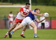 22 June 2019; Kieran Lillis of Laois in action against Benny Heron of Derry during the GAA Football All-Ireland Senior Championship Round 2 match between Derry and Laois at Derry GAA Centre of Excellence in Owenbeg, Derry. Photo by Ramsey Cardy/Sportsfile
