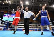 22 June 2019; Kieran Molloy of Ireland, left, is declared the winner following his Men’s Welterweight preliminary round bout against Goce Janeski of Macedonia at Uruchie Sports Palace on Day 2 of the Minsk 2019 2nd European Games in Minsk, Belarus. Photo by Seb Daly/Sportsfile