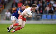 22 June 2019; Rory Brennan of Tyrone in action against Barry McKeon of Longford during the GAA Football All-Ireland Senior Championship Round 2 match between Longford and Tyrone at Glennon Brothers Pearse Park in Longford.  Photo by Eóin Noonan/Sportsfile