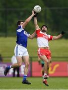 22 June 2019; Conor Boyle of Laois in action against Niall Keenan of Derry during the GAA Football All-Ireland Senior Championship Round 2 match between Derry and Laois at Derry GAA Centre of Excellence in Owenbeg, Derry. Photo by Ramsey Cardy/Sportsfile