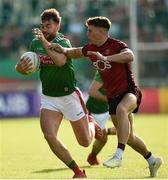 22 June 2019; Aidan O'Shea of Mayo in action against Pirce Laverty of Downduring the GAA Football All-Ireland Senior Championship Round 2 match between Down and Mayo at Pairc Esler in Newry, Down.  Photo by Oliver McVeigh/Sportsfile