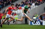 22 June 2019; Sean O'Shea of Kerry races clear of Tomás Clancy of Cork during the Munster GAA Football Senior Championship Final match between Cork and Kerry at Páirc Ui Chaoimh in Cork.  Photo by Brendan Moran/Sportsfile