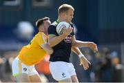 22 June 2019; Peter Kelly of Kildare in action against Conor Murray of Antrim during the GAA Football All-Ireland Senior Championship Round 2 match between Antrim and Kildare at Corrigan Park in Belfast, Antrim. Photo by Ramsey Cardy/Sportsfile