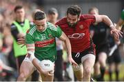 22 June 2019; Evan Regan of Mayo in action against Kevin McKernan of Down during the GAA Football All-Ireland Senior Championship Round 2 match between Down and Mayo at Pairc Esler in Newry, Down.  Photo by Oliver McVeigh/Sportsfile