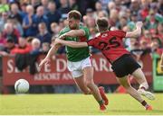 22 June 2019; Aidan O'Shea of Mayo in action against Owen McCabe of Down during the GAA Football All-Ireland Senior Championship Round 2 match between Down and Mayo at Pairc Esler in Newry, Down.  Photo by Oliver McVeigh/Sportsfile