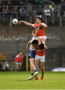 22 June 2019; Niall Grimley of Armagh out jumps his team mate Jarlath Óg Burns and Kieran Hughes of Monaghan to try and win possession  during the GAA Football All-Ireland Senior Championship Round 2 match between Monaghan and Armagh at St Tiarnach's Park in Clones, Monaghan.  Photo by Ray McManus/Sportsfile