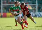 22 June 2019;Andy Moran of Mayo in action against Pat Havern of Down during the GAA Football All-Ireland Senior Championship Round 2 match between Down and Mayo at Pairc Esler in Newry, Down.  Photo by Oliver McVeigh/Sportsfile