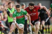22 June 2019; Evan Regan of Mayo in action against Kevin McKernan of Down during the GAA Football All-Ireland Senior Championship Round 2 match between Down and Mayo at Pairc Esler in Newry, Down.  Photo by Oliver McVeigh/Sportsfile