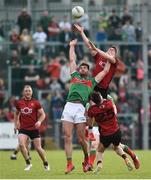 22 June 2019; Aidan O'Shea of Mayo in action against Conor Poland of Down during the GAA Football All-Ireland Senior Championship Round 2 match between Down and Mayo at Pairc Esler in Newry, Down.  Photo by Oliver McVeigh/Sportsfile