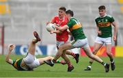 22 June 2019; Kevin O’Donovan of Cork is tackled by Paul Geaney of Kerry during the Munster GAA Football Senior Championship Final match between Cork and Kerry at Páirc Ui Chaoimh in Cork.  Photo by Brendan Moran/Sportsfile