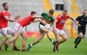 22 June 2019; Gavin White of Kerry is tackled by Kevin O’Donovan and Sean White of Cork during the Munster GAA Football Senior Championship Final match between Cork and Kerry at Páirc Ui Chaoimh in Cork.  Photo by Brendan Moran/Sportsfile