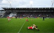 22 June 2019; Cork players, including Liam O’Donovan of Cork, fall to the ground at the final whistle of the Munster GAA Football Senior Championship Final match between Cork and Kerry at Páirc Ui Chaoimh in Cork.  Photo by Brendan Moran/Sportsfile