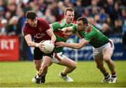 22 June 2019; Donal O'Hare of Down in action against Colm Boyle and Keith Higgins of Mayo during the GAA Football All-Ireland Senior Championship Round 2 match between Down and Mayo at Pairc Esler in Newry, Down.  Photo by Oliver McVeigh/Sportsfile