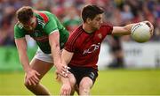 22 June 2019; Conor Poland of Down in action against Aidan O'Shea of Mayo during the GAA Football All-Ireland Senior Championship Round 2 match between Down and Mayo at Pairc Esler in Newry, Down.  Photo by Oliver McVeigh/Sportsfile