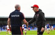22 June 2019; Longford manager Padraic Davis, left, shakes hands with Tyrone manager Mickey Harte following the GAA Football All-Ireland Senior Championship Round 2 match between Longford and Tyrone at Glennon Brothers Pearse Park in Longford.  Photo by Eóin Noonan/Sportsfile