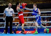 23 June 2019; Regan Buckley of Ireland, right, in action against Bator Sagaluev of Russia during their Men's Light Flyweight bout at Uruchie Sports Palace on Day 3 of the Minsk 2019 2nd European Games in Minsk, Belarus. Photo by Seb Daly/Sportsfile