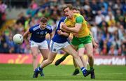 23 June 2019; Hugh McFadden of Donegal is tackled by Ciaran Brady of Cavan during the Ulster GAA Football Senior Championship Final match between Donegal and Cavan at St Tiernach's Park in Clones, Monaghan. Photo by Sam Barnes/Sportsfile