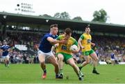 23 June 2019; Niall O’Donnell of Donegal in action against Conor Brady of Cavan during the Ulster GAA Football Senior Championship Final match between Donegal and Cavan at St Tiernach's Park in Clones, Monaghan. Photo by Ramsey Cardy/Sportsfile