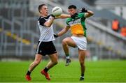 23 June 2019; Ruairí McNamee of Offaly in action against Paul McNamara of Sligo during the GAA Football All-Ireland Senior Championship Round 2 match between Offaly and Sligo at Bord na Mona O'Connor Park in Tullamore, Offaly. Photo by Harry Murphy/Sportsfile