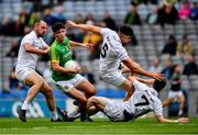 23 June 2019; Jason Scully of Meath 1in action against Kildare players Mark Grace, left, Omar Dunne, 5, and Owen Whelan  during the Leinster Junior Football Championship Final match between Meath and Kildare at Croke Park in Dublin. Photo by Ray McManus/Sportsfile