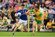 23 June 2019; Dara McVeety of Cavan in action against Paddy McGrath of Donegal during the Ulster GAA Football Senior Championship Final match between Donegal and Cavan at St Tiernach's Park in Clones, Monaghan. Photo by Sam Barnes/Sportsfile