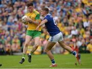 23 June 2019; Niall O’Donnell  of Donegal in action against Oisin Kiernan of Cavan during the Ulster GAA Football Senior Championship Final match between Donegal and Cavan at St Tiernach's Park in Clones, Monaghan. Photo by Oliver McVeigh/Sportsfile