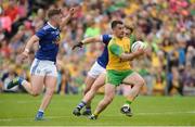 23 June 2019; Paddy McGrath of Donegal in action against Oisin Pierson and Padraig Faulkner of Cavan during the Ulster GAA Football Senior Championship Final match between Donegal and Cavan at St Tiernach's Park in Clones, Monaghan. Photo by Oliver McVeigh/Sportsfile