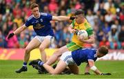 23 June 2019; Patrick McBrearty of Donegal in action against Ciaran Brady, left, and Padraig Faulkner of Cavan during the Ulster GAA Football Senior Championship Final match between Donegal and Cavan at St Tiernach's Park in Clones, Monaghan. Photo by Sam Barnes/Sportsfile