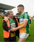 23 June 2019; Anton Sullivan of Offaly shakes is congratulated by Mick McDonagh from Tullamore, Co. Offaly, following the GAA Football All-Ireland Senior Championship Round 2 match between Offaly and Sligo at Bord na Mona O'Connor Park in Tullamore, Offaly. Photo by Harry Murphy/Sportsfile