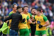 23 June 2019; Michael Murphy, left, Patrick McBrearty, and Jamie Brennan of Donegal celebrate following the Ulster GAA Football Senior Championship Final match between Donegal and Cavan at St Tiernach's Park in Clones, Monaghan. Photo by Ramsey Cardy/Sportsfile