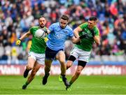 23 June 2019; Brian Fenton of Dublin in action against Michael Newman and Ben Brennan of Meath during the Leinster GAA Football Senior Championship Final match between Dublin and Meath at Croke Park in Dublin. Photo by Ray McManus/Sportsfile