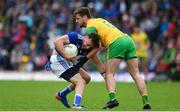 23 June 2019; Conor Moynagh of Cavan in action against Daire Ó Baoill of Donegal during the Ulster GAA Football Senior Championship Final match between Donegal and Cavan at St Tiernach's Park in Clones, Monaghan. Photo by Sam Barnes/Sportsfile