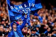 23 June 2019; A supporter waves his Dublin flag during the Leinster GAA Football Senior Championship Final match between Dublin and Meath at Croke Park in Dublin. Photo by Ray McManus/Sportsfile