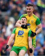 23 June 2019; Jamie Brennan celebrates with Donegal team-mate Patrick McBrearty after scoring his side's first goal during the Ulster GAA Football Senior Championship Final match between Donegal and Cavan at St Tiernach's Park in Clones, Monaghan. Photo by Ramsey Cardy/Sportsfile