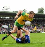 23 June 2019; Hugh McFadden of Donegal is tackled by Padraig Faulkner of Cavan during the Ulster GAA Football Senior Championship Final match between Donegal and Cavan at St Tiernach's Park in Clones, Monaghan. Photo by Ramsey Cardy/Sportsfile