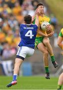 23 June 2019; Michael Langan of Donegal in action against Conor Moynagh of Cavan during the Ulster GAA Football Senior Championship Final match between Donegal and Cavan at St Tiernach's Park in Clones, Monaghan. Photo by Ramsey Cardy/Sportsfile