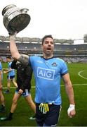 23 June 2019; Dublin's Michael Darragh Macauley with the Delaney Cup after the Leinster GAA Football Senior Championship Final match between Dublin and Meath at Croke Park in Dublin. Photo by Ray McManus/Sportsfile