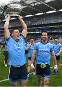 23 June 2019; Dublin's Brian Howard, with Michael Darragh Macauley alongside,  with the Delaney Cup after the Leinster GAA Football Senior Championship Final match between Dublin and Meath at Croke Park in Dublin. Photo by Ray McManus/Sportsfile