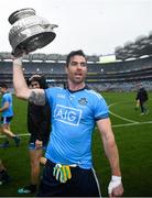 23 June 2019; Dublin's Michael Darragh Macauley with the Delaney Cup after the Leinster GAA Football Senior Championship Final match between Dublin and Meath at Croke Park in Dublin. Photo by Ray McManus/Sportsfile