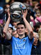 23 June 2019; Brian Fenton of Dublin lifts the Delaney cup after the Leinster GAA Football Senior Championship Final match between Dublin and Meath at Croke Park in Dublin. Photo by Ray McManus/Sportsfile