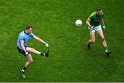 23 June 2019; Dean Rock of Dublin kicks a point despite the efforts of Conor McGill of Meath during the Leinster GAA Football Senior Championship Final match between Dublin and Meath at Croke Park in Dublin. Photo by Brendan Moran/Sportsfile