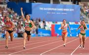 23 June 2019; Krystsina Tsimanouskaya of Belarus, second left, celebrates as she crosses the line to win the Women's 100m during Dynamic New Athletics qualification match three at Dinamo Stadium on Day 3 of the Minsk 2019 2nd European Games in Minsk, Belarus. Photo by Seb Daly/Sportsfile
