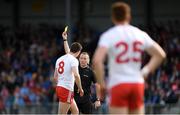 22 June 2019; Colm Cavanagh of Tyrone is shown a yellow card by referee Derek O'Mahoney during the GAA Football All-Ireland Senior Championship Round 2 match between Longford and Tyrone at Glennon Brothers Pearse Park in Longford.  Photo by Eóin Noonan/Sportsfile