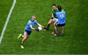 23 June 2019; Paul Mannion of Dublin plays the ball as James McEntee of Meath is blocked by Michael Darragh Macauley of Dublin during the Leinster GAA Football Senior Championship Final match between Dublin and Meath at Croke Park in Dublin. Photo by Brendan Moran/Sportsfile