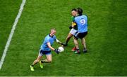 23 June 2019; Paul Mannion of Dublin plays the ball as James McEntee of Meath is blocked by Michael Darragh Macauley of Dublin during the Leinster GAA Football Senior Championship Final match between Dublin and Meath at Croke Park in Dublin. Photo by Brendan Moran/Sportsfile