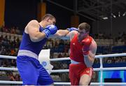 24 June 2019; Dean Gardiner of Ireland, right, in action against Mikheil Bakhtidze of Georgia during their Men's Super Heavyweight bout at Uruchie Sports Palace on Day 4 of the Minsk 2019 2nd European Games in Minsk, Belarus. Photo by Seb Daly/Sportsfile
